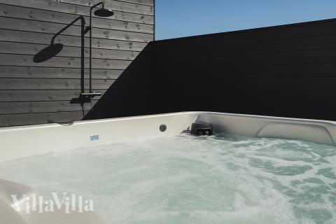 Njut av spabadets värme i lyxstuga nr 922 i Fyn och öar