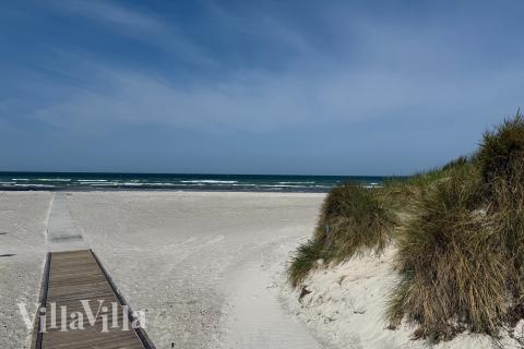 Stranden i närheten av lyxhus 914.