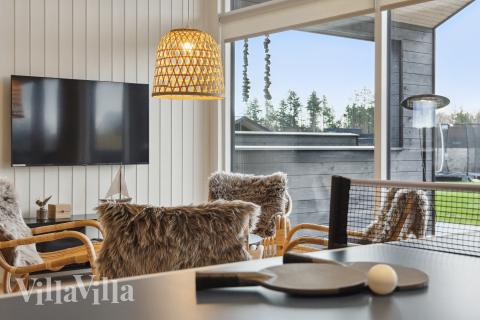 Tävla i sommarhusets aktivitetsrum när ni besöker lyxhus nr 932 i Fyn och öar.