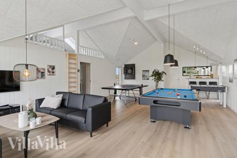 Tävla i sommarhusets aktivitetsrum när ni besöker lyxhus nr 934 i Lolland/Falster/Møn.