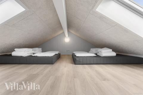 Några av de 30 sovplatserna finns på loftet i lyxstuga nr 910