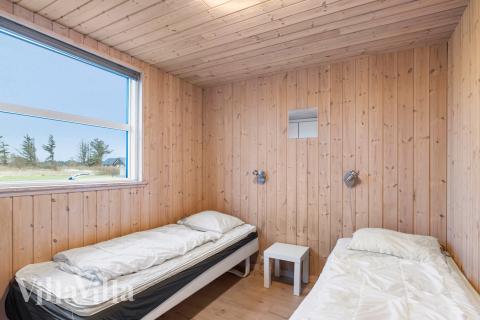 Ett av de 9 utmärkta sovrummen i lyxstuga nr 196 i Nordjylland.