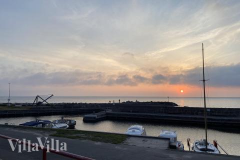Stranden i närheten av lyxhus 927.