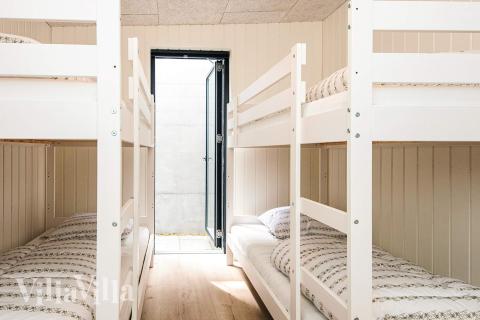 Ett av de 7 utmärkta sovrummen i lyxstuga nr 941 i Østjylland.