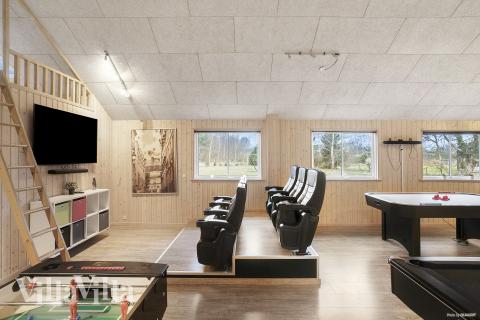 Aktivitetsrum i lyxstuga nr 314 med 8 sovrum och plats för 20 personer.