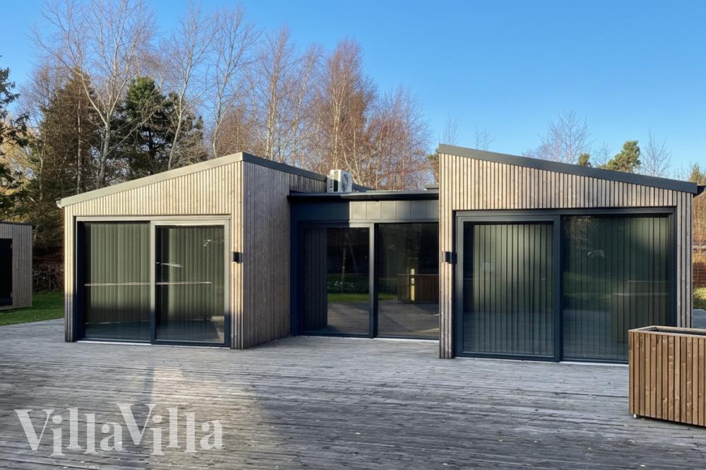 Njut av en grillkväll på terrassen i lyxstuga nr 924 i Lolland/Falster/Møn