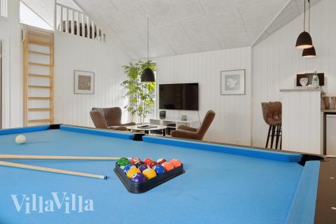 Tävla i sommarhusets aktivitetsrum när ni besöker lyxhus nr 915 i Fyn och öar.