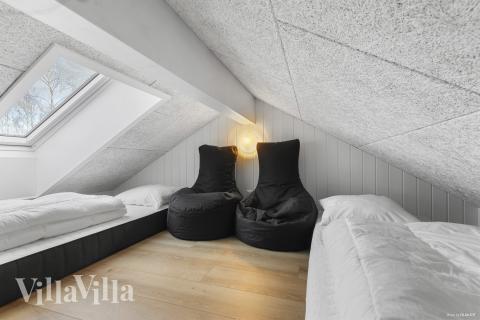 Några av de 18 sovplatserna finns på loftet i lyxstuga nr 810