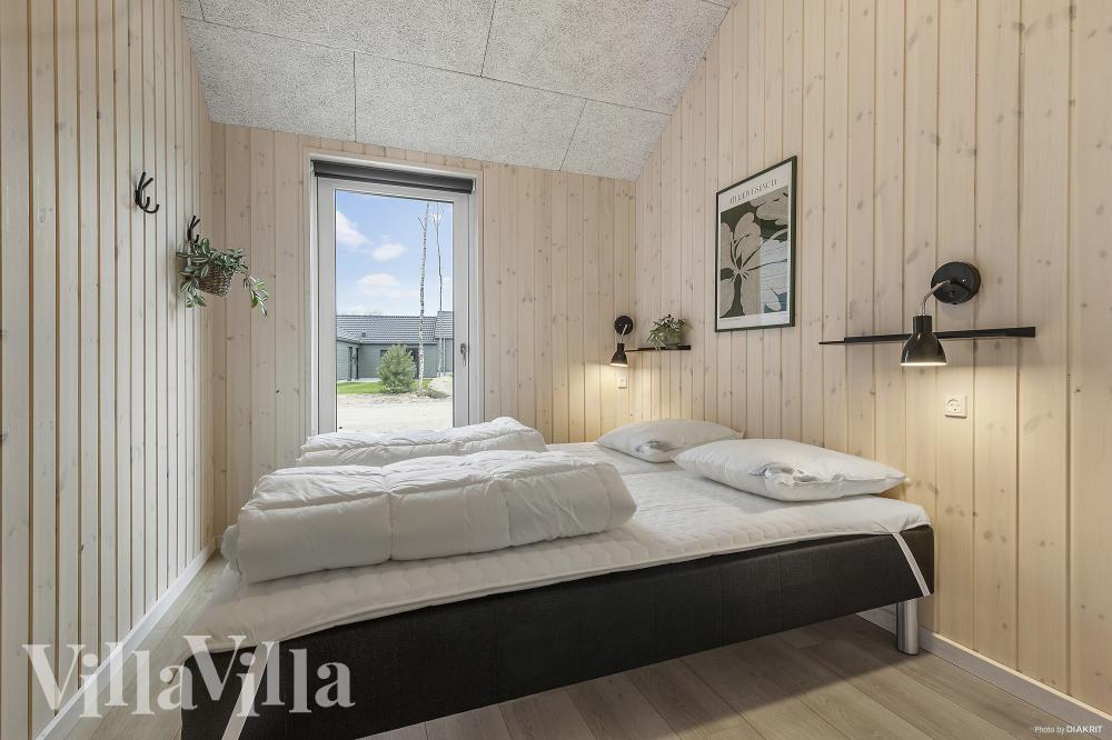 Ett av de 10 utmärkta sovrummen i lyxstuga nr 814 i Østjylland.