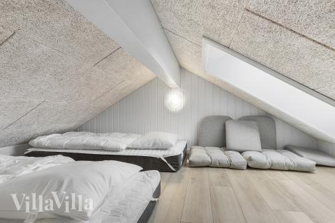 Några av de 26 sovplatserna finns på loftet i lyxstuga nr 814