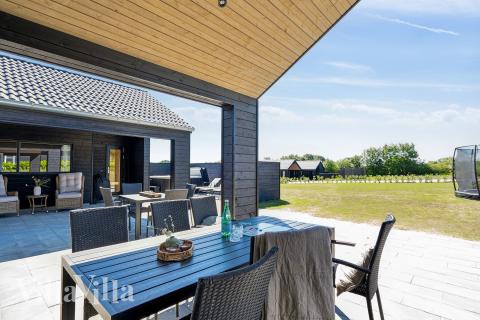 Njut av en grillkväll på terrassen i lyxstuga nr 771 i Tyskland