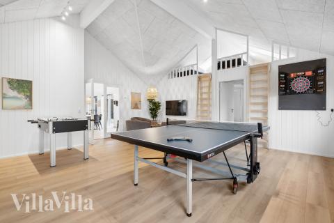 Aktivitetsrum i lyxstuga nr 774 med 8 sovrum och plats för 20 personer.