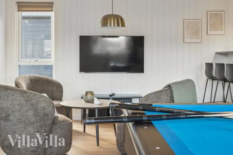 Tävla i sommarhusets aktivitetsrum när ni besöker lyxhus nr 772 i Tyskland.