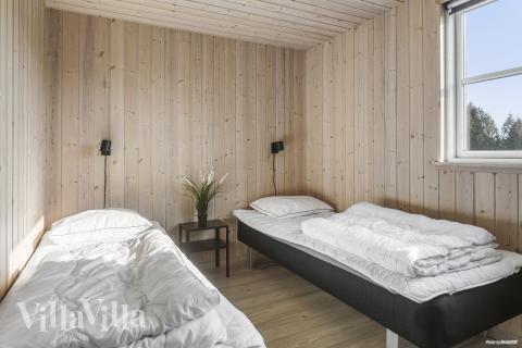 Ett av de 7 utmärkta sovrummen i lyxstuga nr 251 i Lolland/Falster/Møn.