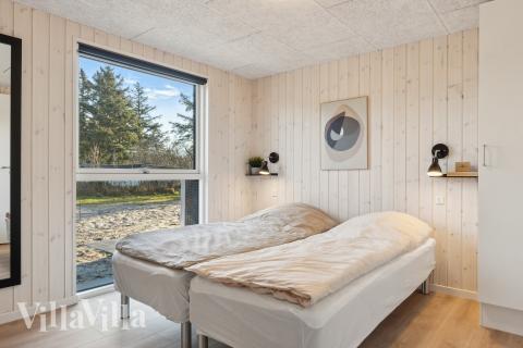 Ett av de 9 utmärkta sovrummen i lyxstuga nr 773 i Tyskland.