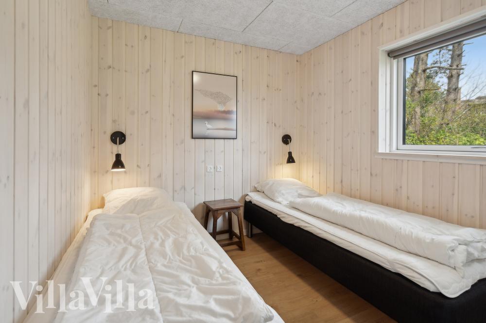 Ett av de 6 utmärkta sovrummen i lyxstuga nr 775 i Tyskland.