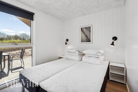 Ett av de 9 utmärkta sovrummen i lyxstuga nr 777 i Tyskland.