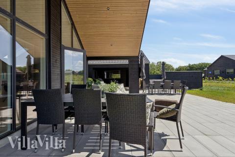 Njut av en grillkväll på terrassen i lyxstuga nr 777 i Tyskland