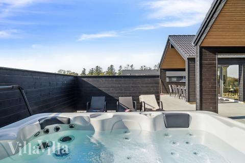 Njut av spabadets värme i lyxstuga nr 779 i Tyskland