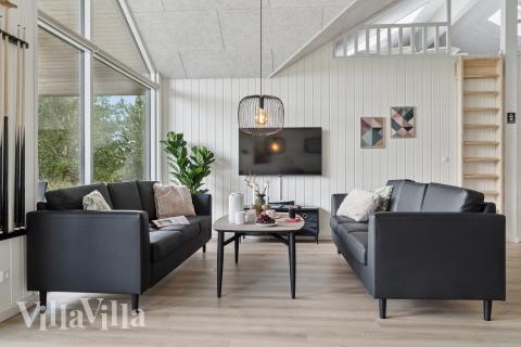 Aktivitetsrum i lyxstuga nr 783 med 10 sovrum och plats för 26 personer.