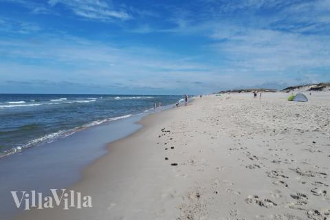 Stranden i närheten av lyxhus 528.