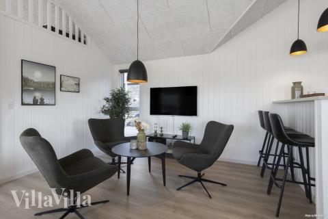 Aktivitetsrum i lyxstuga nr 907 med 7 sovrum och plats för 18 personer.