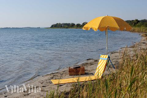 Stranden i närheten av lyxhus 951.