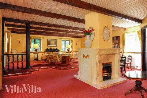 Ett av de 9 utmärkta sovrummen i lyxstuga nr 951 i Fyn och öar.