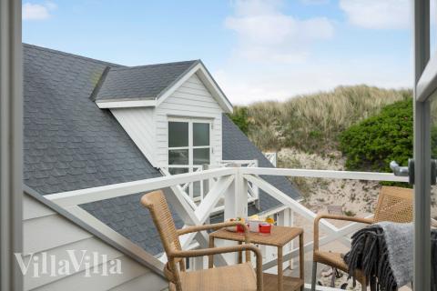 Njut av en grillkväll på terrassen i lyxstuga nr 953 i Vestjylland