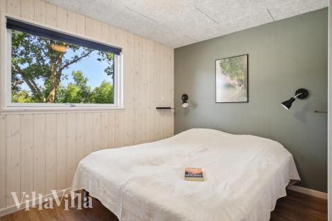 Ett av de 5 utmärkta sovrummen i lyxstuga nr 904 i Nordsjälland.