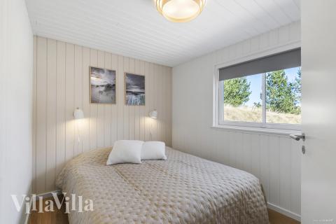 Ett av de 7 utmärkta sovrummen i lyxstuga nr 273 i Vestjylland.