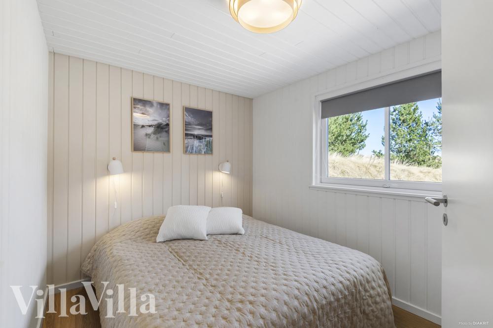 Ett av de 7 utmärkta sovrummen i lyxstuga nr 273 i Vestjylland.