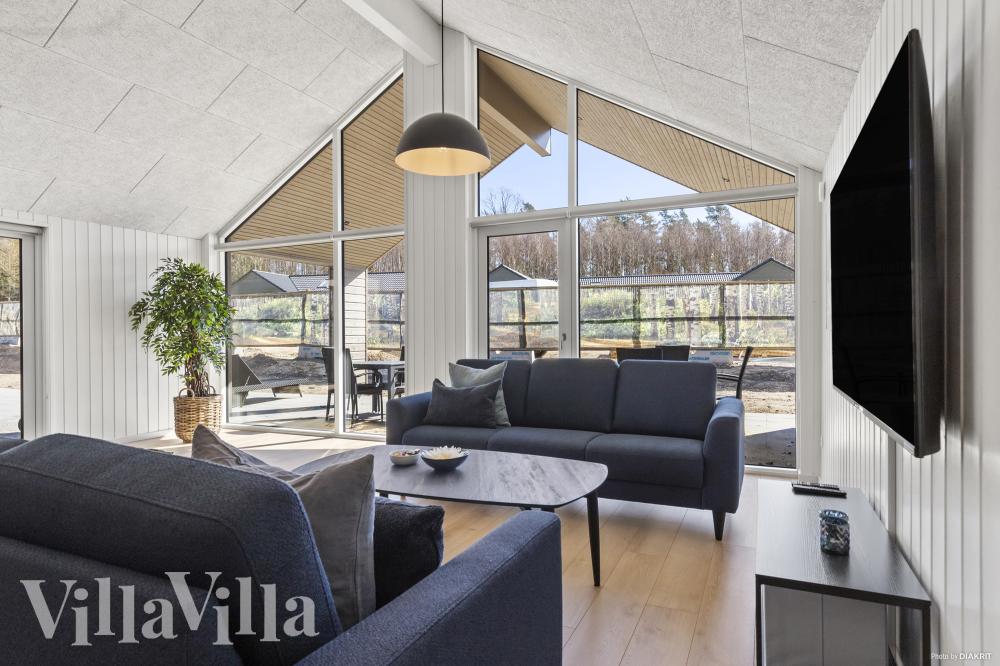 Tävla i sommarhusets aktivitetsrum när ni besöker lyxhus nr 822 i Østjylland.