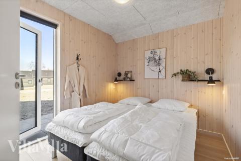 Ett av de 12 utmärkta sovrummen i lyxstuga nr 822 i Østjylland.