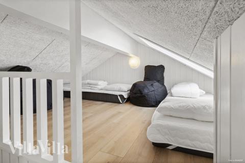 Några av de 30 sovplatserna finns på loftet i lyxstuga nr 822