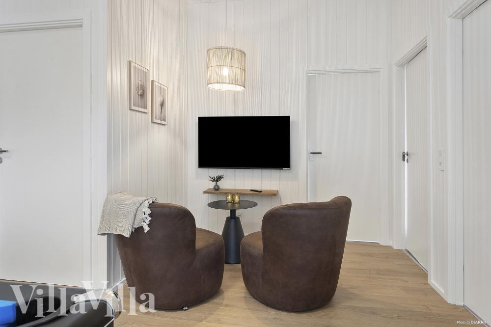 Aktivitetsrum i lyxstuga nr 919 med 6 sovrum och plats för 12 personer.