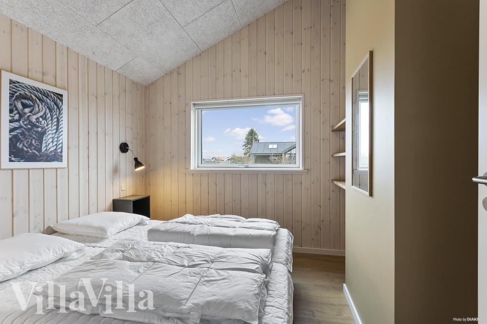Ett av de 6 utmärkta sovrummen i lyxstuga nr 919 i Fyn och öar.