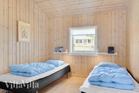 Ett av de 5 utmärkta sovrummen i lyxstuga nr 963 i Nordsjälland.