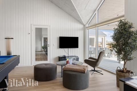 Tävla i sommarhusets aktivitetsrum när ni besöker lyxhus nr 917 i Fyn och öar.