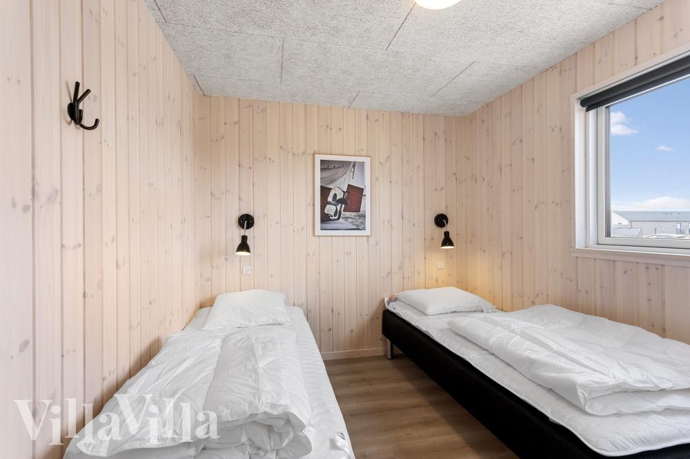 Ett av de 8 utmärkta sovrummen i lyxstuga nr 917 i Fyn och öar.