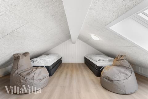 Några av de 20 sovplatserna finns på loftet i lyxstuga nr 917