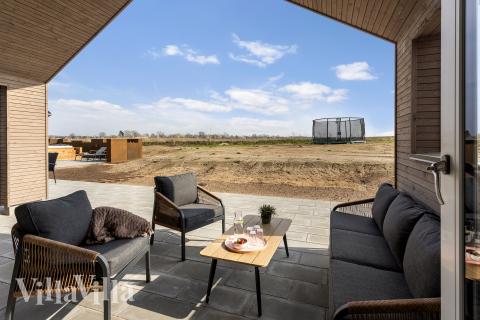 Stor terrass i lyxstuga nr 917 i Fyn och öar.