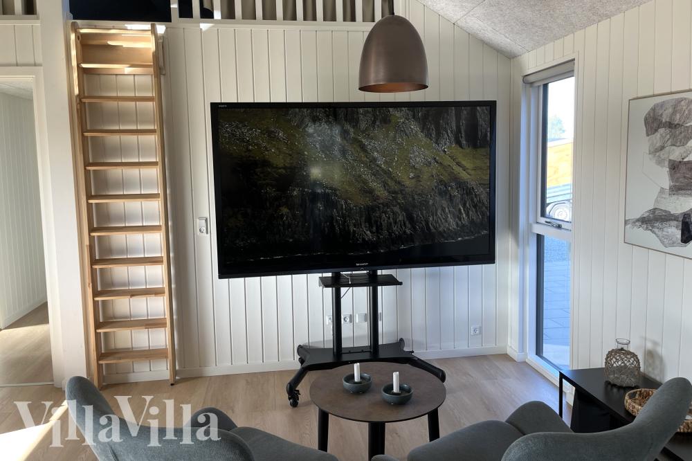 Aktivitetsrum i lyxstuga nr 630 med 6 sovrum och plats för 16 personer.