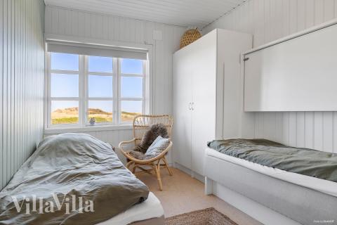 Ett av de 11 utmärkta sovrummen i lyxstuga nr 952 i Nordjylland.