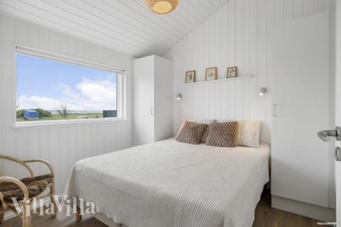 Ett av de 4 utmärkta sovrummen i lyxstuga nr 935 i Nordsjälland.