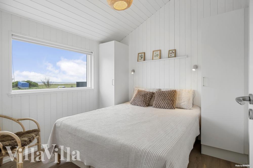 Ett av de 4 utmärkta sovrummen i lyxstuga nr 935 i Nordsjälland.