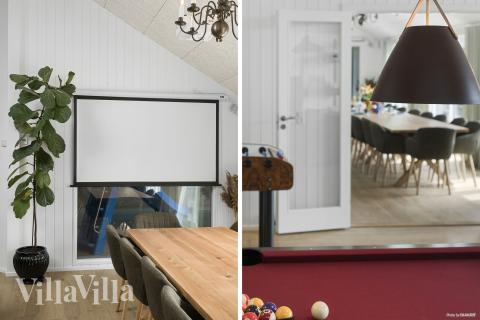 Det stora ljusa vardagsrummet i lyxstuga nr 934 för 26.
