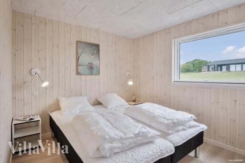 Ett av de 5 utmärkta sovrummen i lyxstuga nr 922 i Fyn och öar.