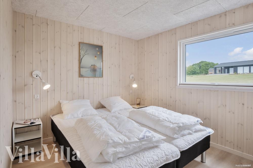 Ett av de 5 utmärkta sovrummen i lyxstuga nr 922 i Fyn och öar.