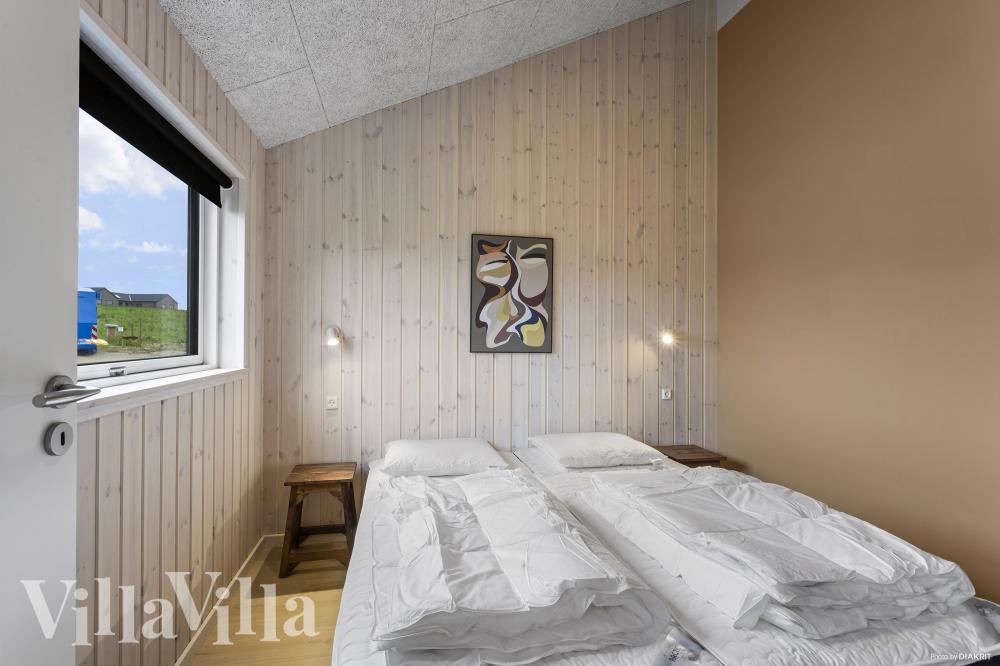 Ett av de 6 utmärkta sovrummen i lyxstuga nr 955 i Fyn och öar.